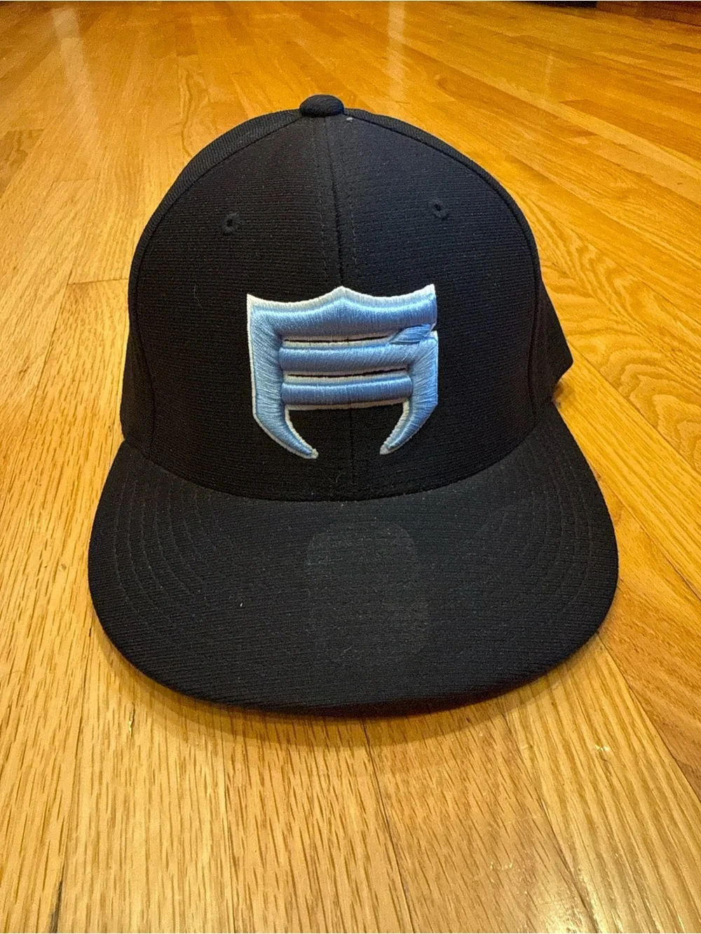 Black Snapback Hat with Light Blue Raised Logo - Cap America Premium Line